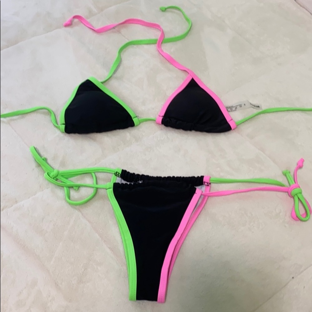 neon pink and green bathing suit